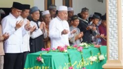 Pj Bupati Langkat Faisal Hasrimy Pimpin Upacara Pelepasan Jenazah Kades Serapuh ABC